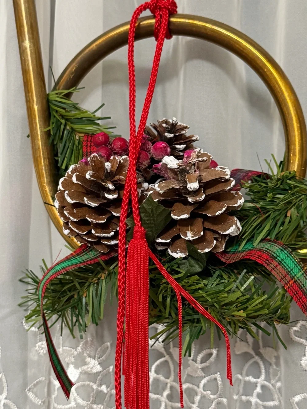 Holiday Brass Horn Ornament with Pinecone and Red Tassel
